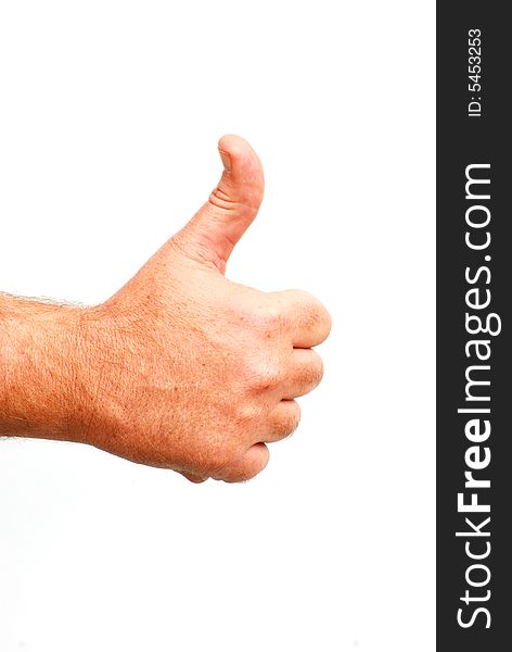 Shot of a thumbs up hand against white