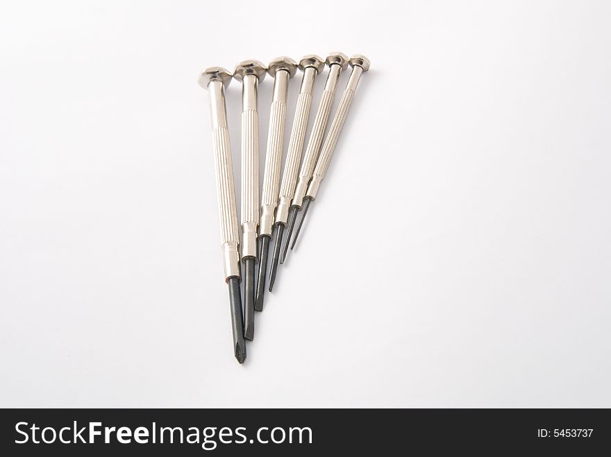 A set of Mini multi-function screwdrivers in white background