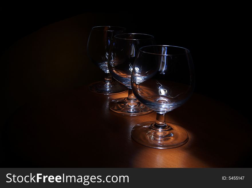 Empty glass of wine in the dark. Empty glass of wine in the dark