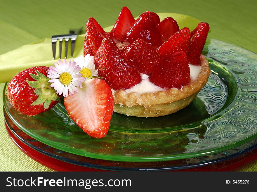 Strawberry cake with pudding on a plate