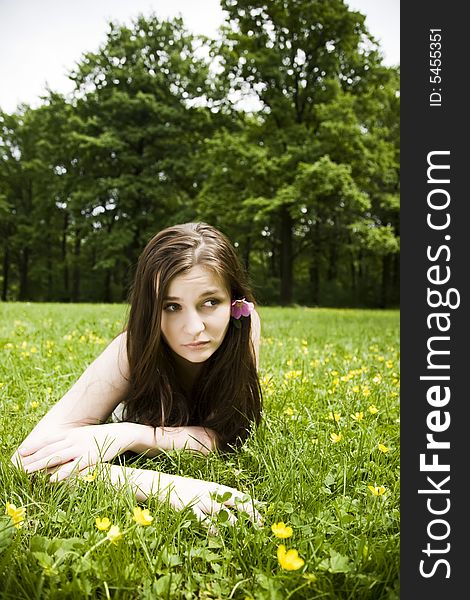 Woman Relaxing On The Meadow. Woman Relaxing On The Meadow
