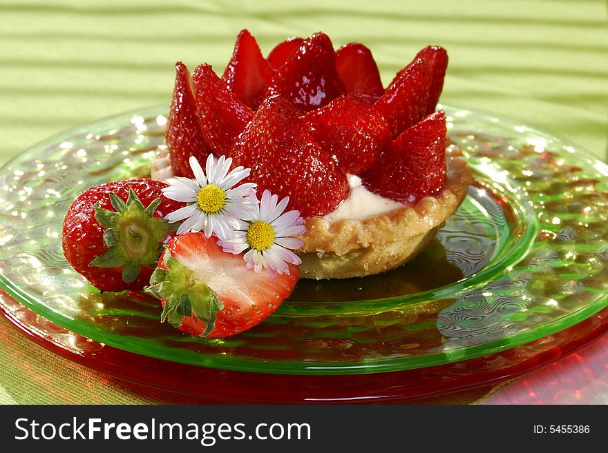 Strawberry cake with pudding on a plate