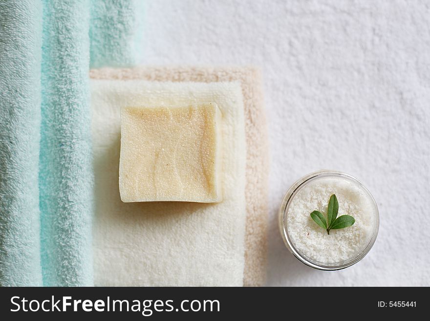Conceptual photo with beauty items  soap, towels, peeling and nature leaves. Conceptual photo with beauty items  soap, towels, peeling and nature leaves