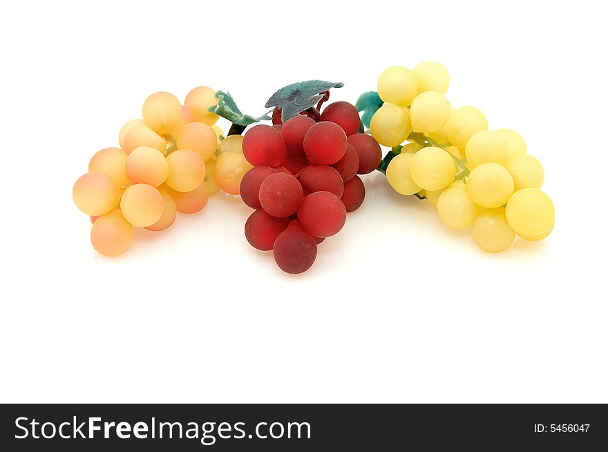 Three bunches of grapes.