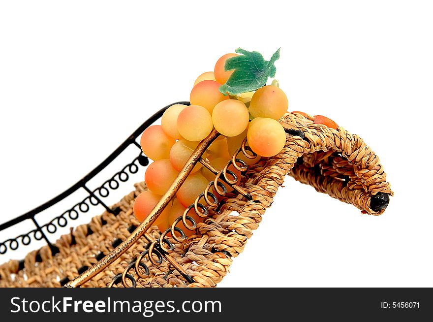 Bunch of grapes isolated on white background. Bunch is in the basket. Bunch of grapes isolated on white background. Bunch is in the basket.