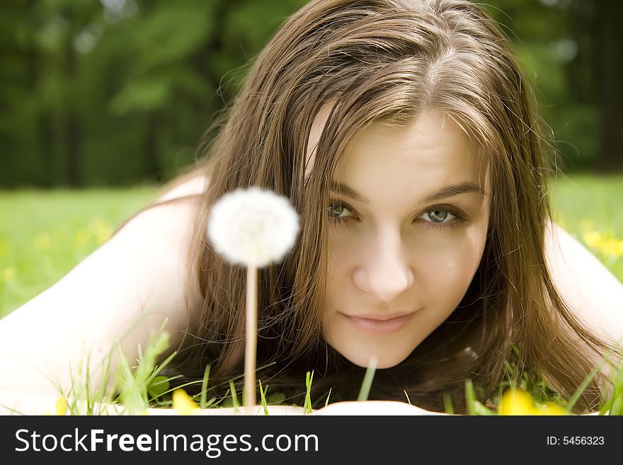 The Woman Laying On A Grass. The Woman Laying On A Grass