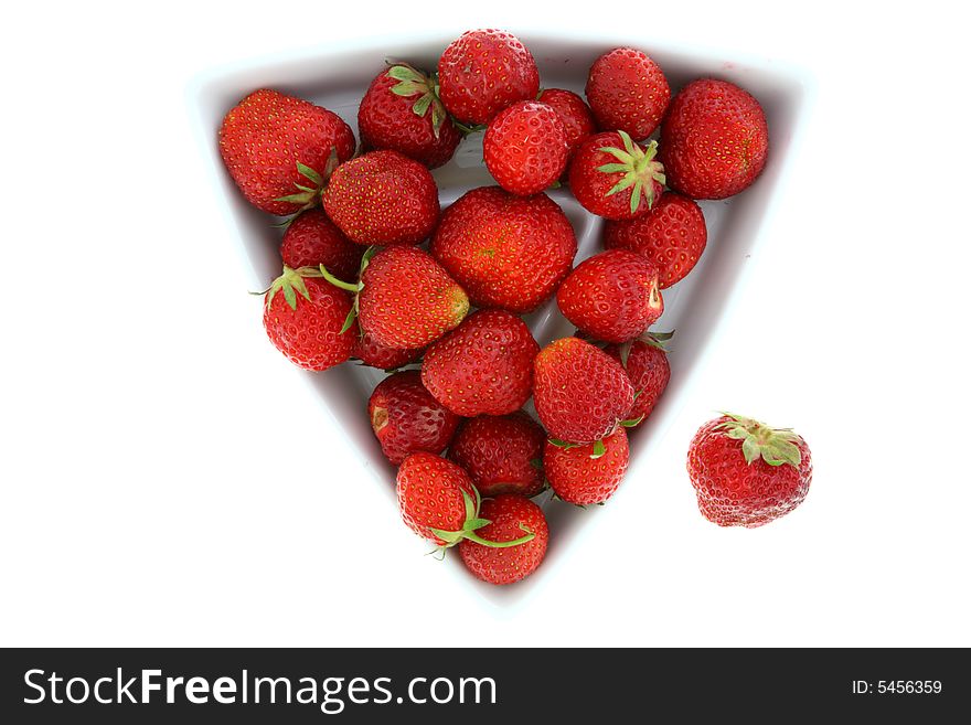 Bowl of strawberries on white.