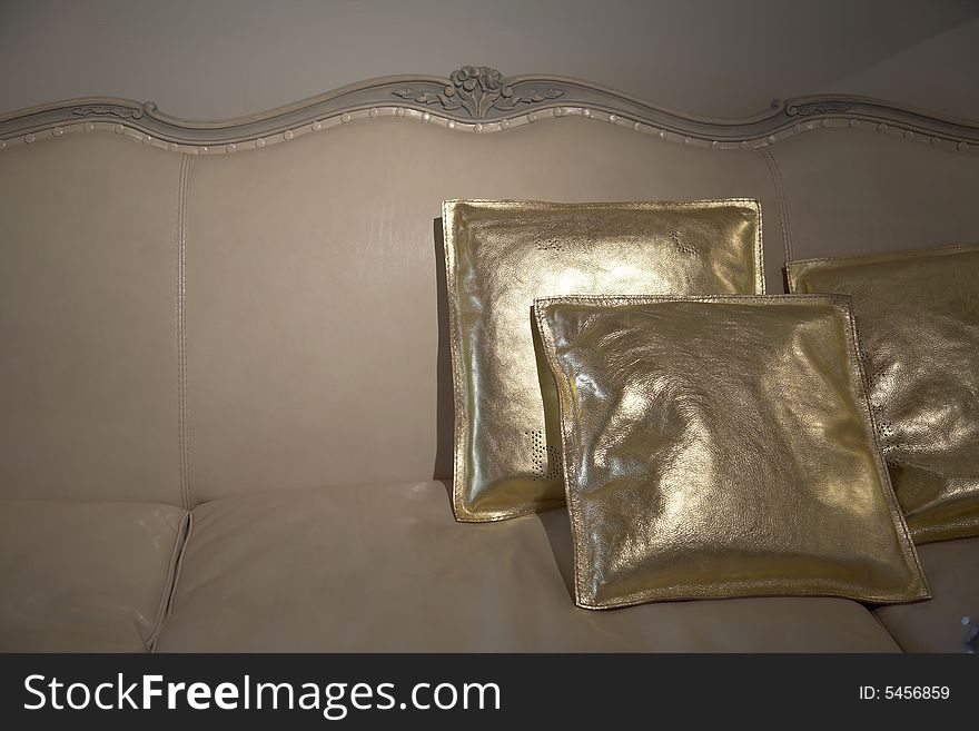 Rich sofa with golden pillows. Rich sofa with golden pillows