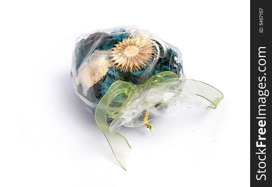 Green Potpourri in a plastic bag, on a white background. Green Potpourri in a plastic bag, on a white background