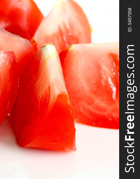 Sliced fresh red tomato isolated