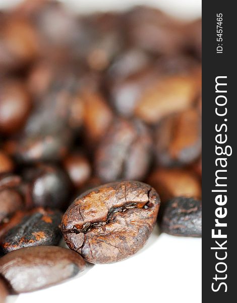Freshly roasted coffee beans isolated. Freshly roasted coffee beans isolated.
