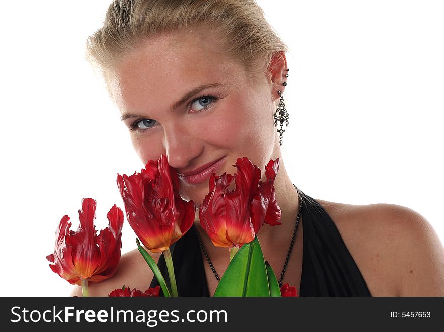 Woman in dress with tulips flowers isolated on white background