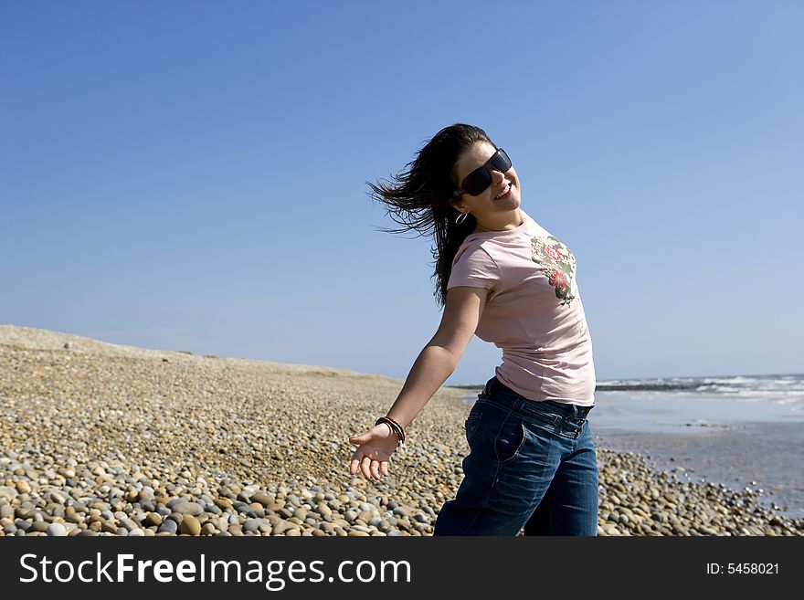 Young Joyful Woman In Beach During Hot Summer Day