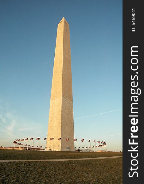 Partial view of the Washington
Monument and the American flags. Partial view of the Washington
Monument and the American flags