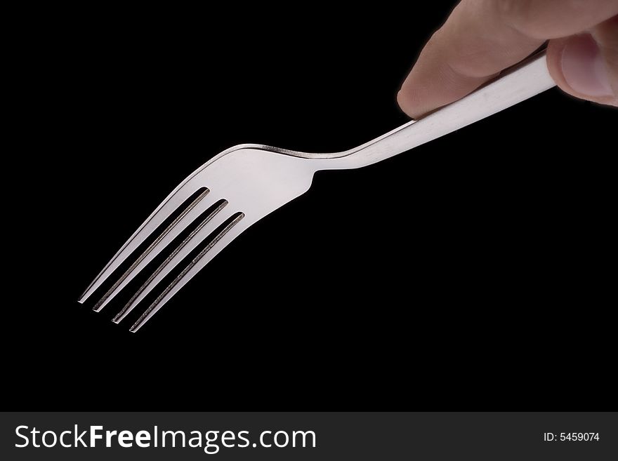 Hand held fork moving in direction of meal (INVISIBLE MEAL)