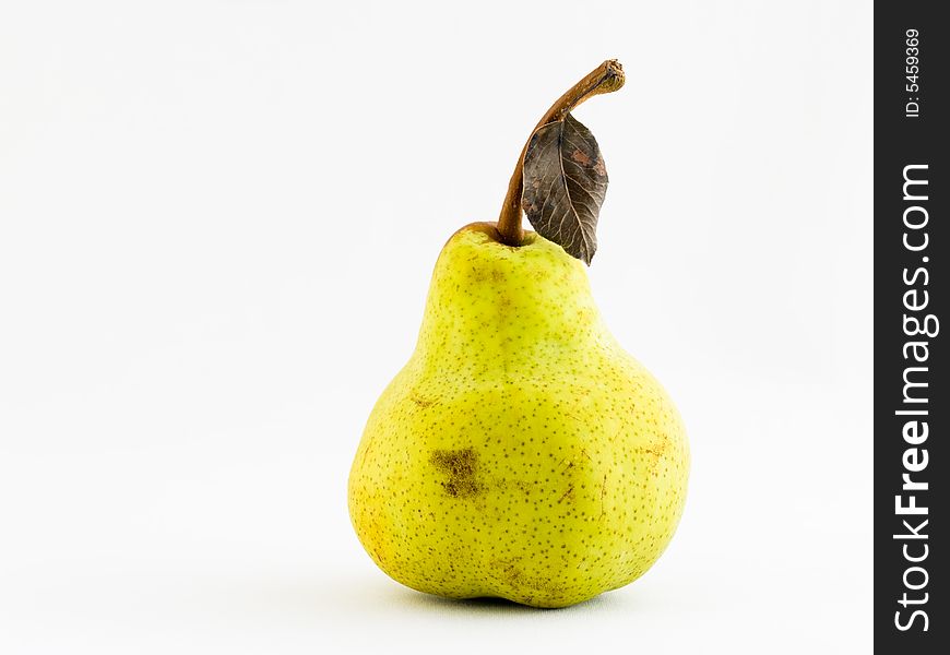 Pear With Dried Leaf On Stalk