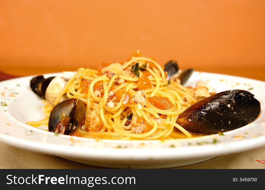 Seafood spaghetti with mussels and shrimp and octupus. Seafood spaghetti with mussels and shrimp and octupus