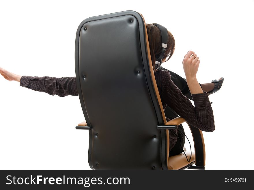 Young business woman on armchair Speaks by phone. Isolated over white background