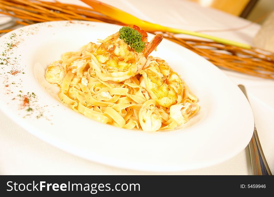 Seafood pasta with jumbo shrimp and fish