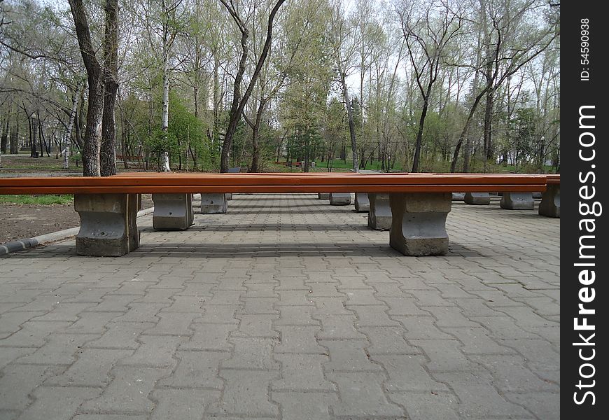 Benches together standing in a row seating. Benches together standing in a row seating.