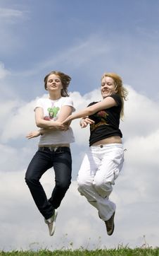 The Two Happy Jumping Girls Stock Photos The Two Happy Jumping Girls Stock Photos
