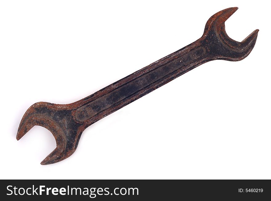 Old rusty wrench on the white background. Old rusty wrench on the white background.