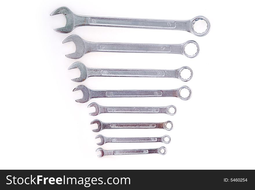 Set of chromium painted wrenches on the white background. Set of chromium painted wrenches on the white background.