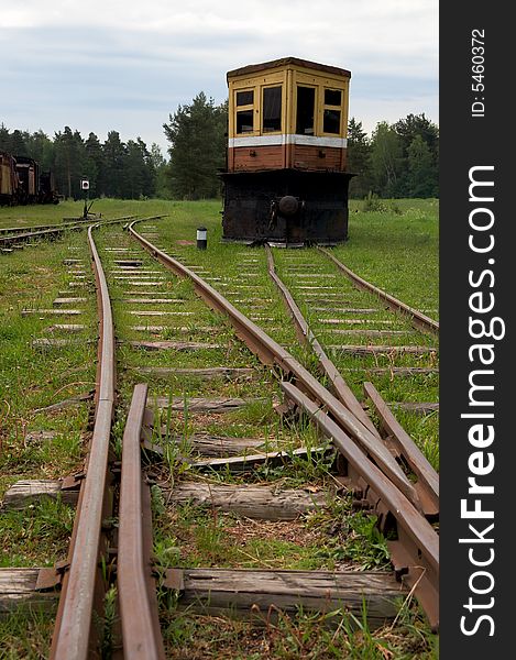 Old rusty railroad with old locomotive