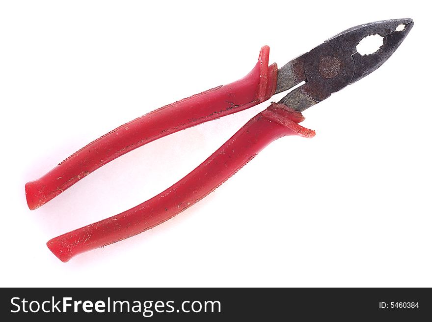 Combination pliers with red plastic handle on the white background. Combination pliers with red plastic handle on the white background.
