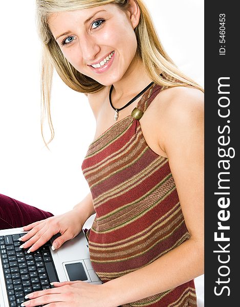 Beautiful girl with blonde hair using laptop
