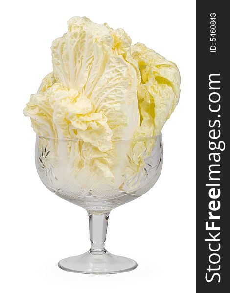 Fresh celery cabbage in a glass isolated on a white background