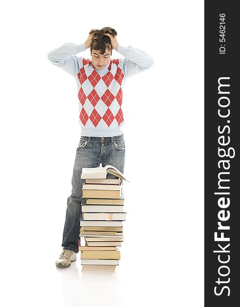 The young student with the books isolated on a white background