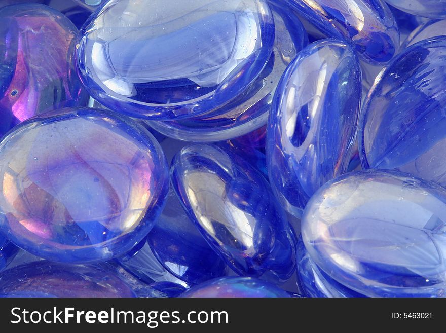 Some Blue glass beads macro texture background