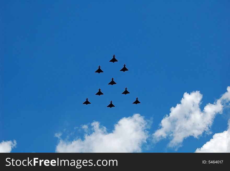 Fighter planes flying in formation