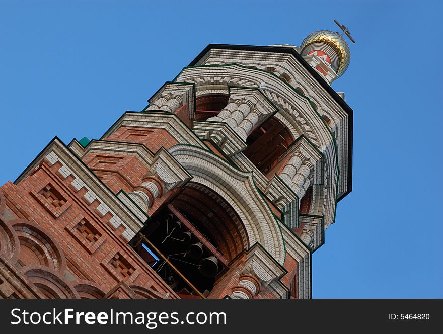 Belltower of Russian Orthodox Church of Kazan icon of the Mother of God  in Astrakhan, Russia. Belltower of Russian Orthodox Church of Kazan icon of the Mother of God  in Astrakhan, Russia