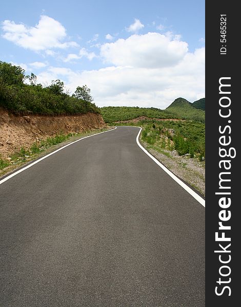 A view of road left turn curve in tibet. A view of road left turn curve in tibet