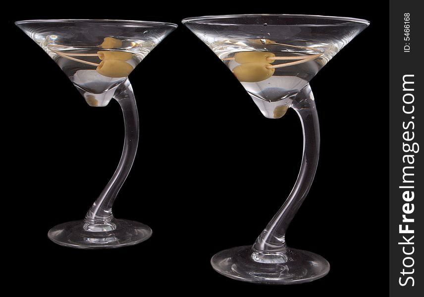 Two Martinis with olive on black. Two Martinis with olive on black