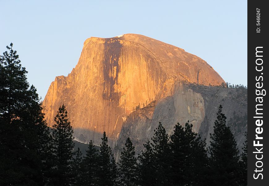 Golden Sunset Light Illuminating Yosemite's Half Dome. Golden Sunset Light Illuminating Yosemite's Half Dome