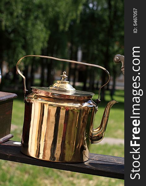 The copper antique kettle in summer, outdoor