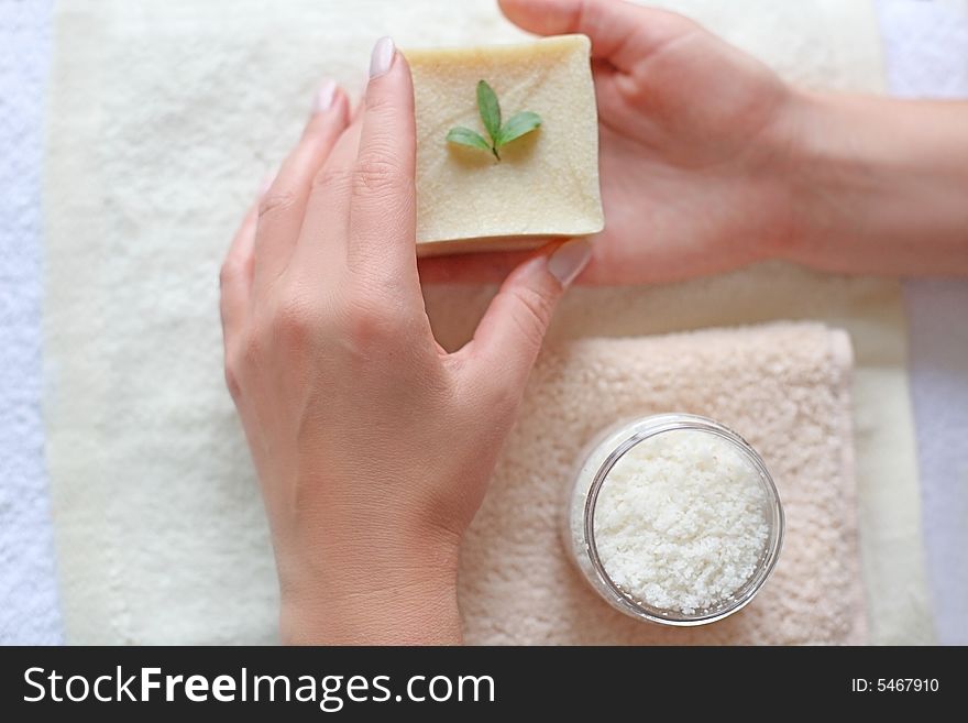 Conceptual photo with beautiful hands soap, towels, peeling. Conceptual photo with beautiful hands soap, towels, peeling