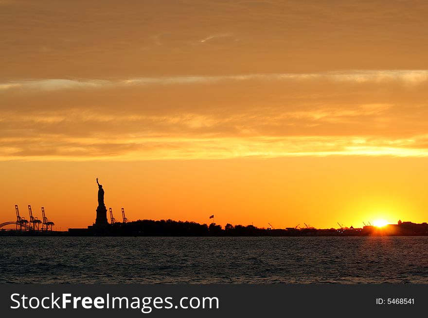 Statue of Liberty and The Sunset in Manhattan