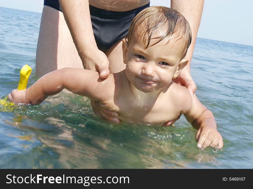 Close up portrait of swimming baby