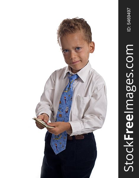 Young boy dressed as businessman holds money - isolated on white