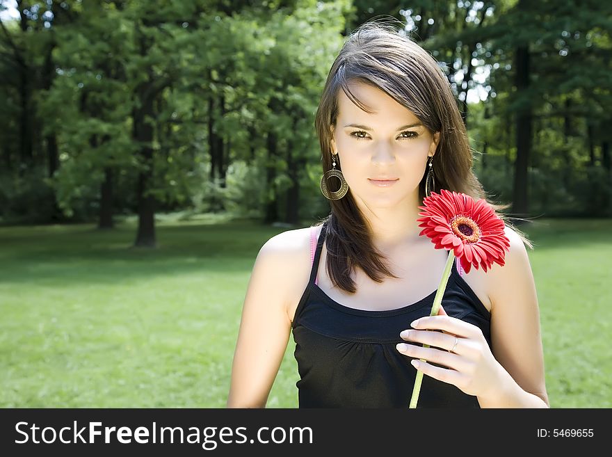 Brunette Model With Red Flower