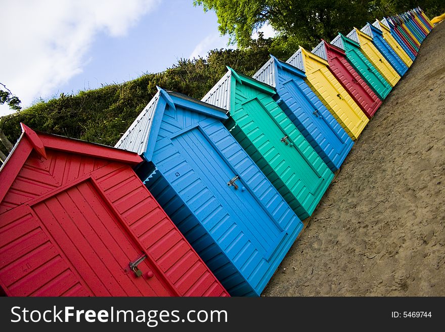 Colourful wooden british beach huts