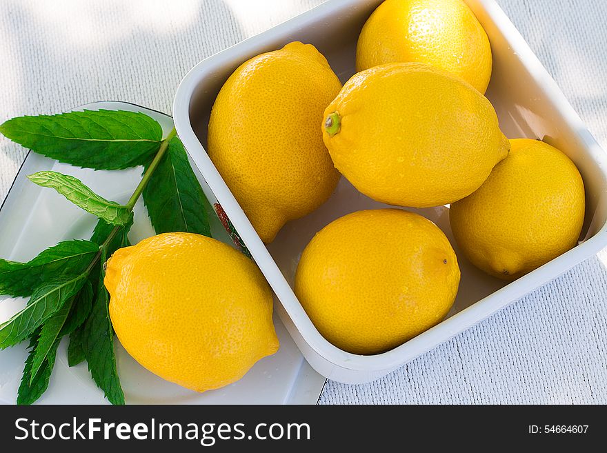 Fresh lemon and a sprig of mint