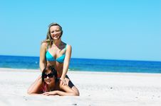 Young Girls On The Summer Beach Royalty Free Stock Images
