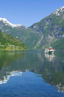 Boat In The Ocean, Geiranger Fjord Royalty Free Stock Photo Boat In The Ocean, Geiranger Fjord Royalty Free Stock Photo