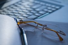 White Laptop And Glasses Royalty Free Stock Photo White Laptop And Glasses Royalty Free Stock Photo