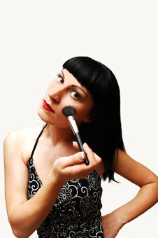 Young Woman Putting Make-up On. Stock Image Young Woman Putting Make-up On. Stock Image